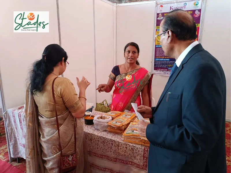 Anita with her products at an exhibition
