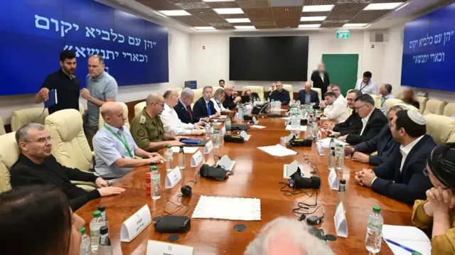 Israel security cabinet meets in a closed-off room, Benjamin Netanyahu chairing the gathering