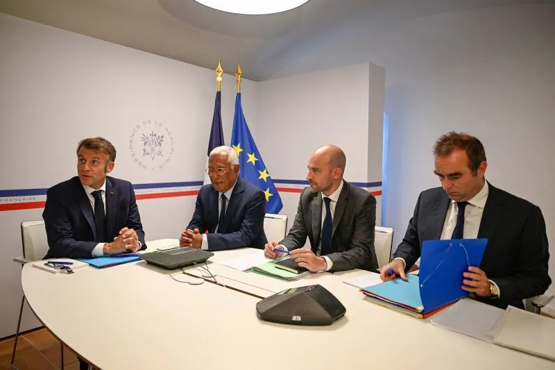 French President Emmanuel Macron, President of the European Council Antonio Costa, French Minister for Europe and Foreign Affairs Jean-Noel Barrot and France's Minister of Armed Forces Sebastien Lecornu attend a video conference with US President Donald Trump, Ukrainian President Volodymyr Zelenskiy and European Union leaders, at Fort de Bregancon in Bormes-les-Mimosas, France, on Friday.