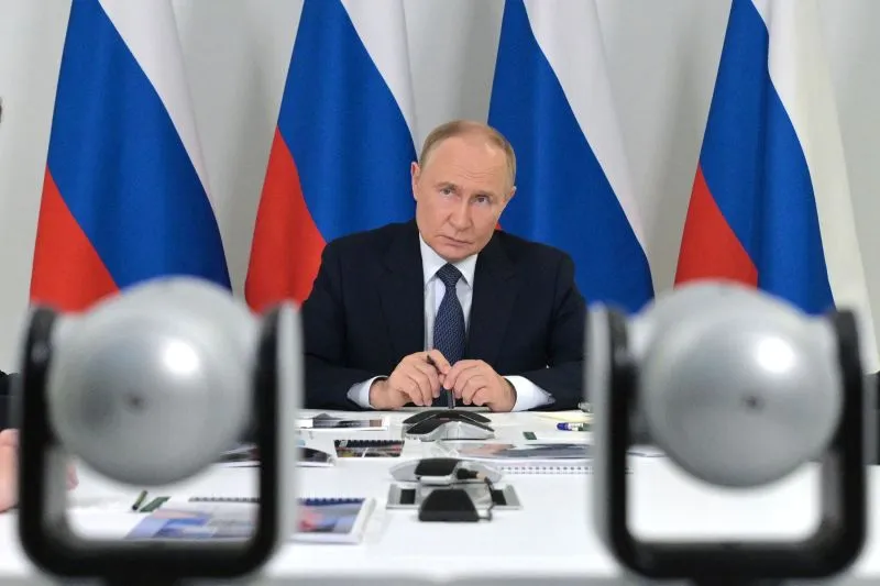 President Vladimir Putin attends a meeting in Magadan, Russia, on Friday during his journey to Alaska.