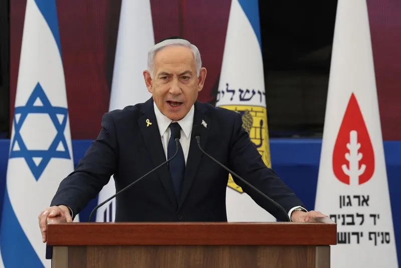Israeli Prime Minister Benjamin Netanyahu speaks on the eve of Israel's Remembrance Day for fallen soldiers at the Yad LaBanim Memorial in Jerusalem, on Tuesday.