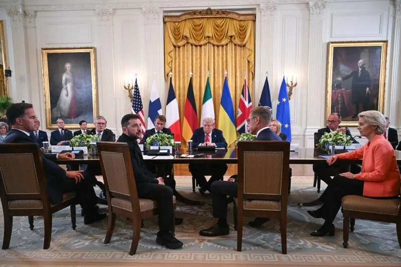 NATO Secretary-General Mark Rutte, British Prime Minister Keir Starmer, Ukrainian President Volodymyr Zelensky, French President Emmanuel Macron, US President Donald Trump, Finnish President Alexander Stubb, Italian Prime Minister Giorgia Meloni, German Chancellor Friedrich Merz, and European Commission President Ursula von der Leyen participate in a meeting in the White House in Washington, DC, on Monday.