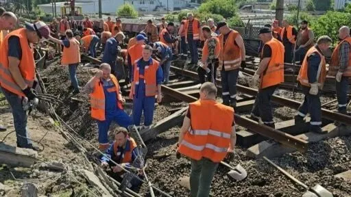Kyiv workers repair rail line after overnight Russia attack