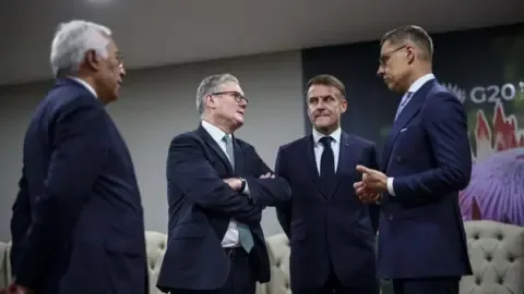 PA From left to right: European Council President António Costa, UK Prime Minister Sir Keir Starmer, France's President Emmanuel Macron and Finland's President Alexander Stubb at the G20 summit in Johannesburg, South Africa. Photo: 22 November 2025
