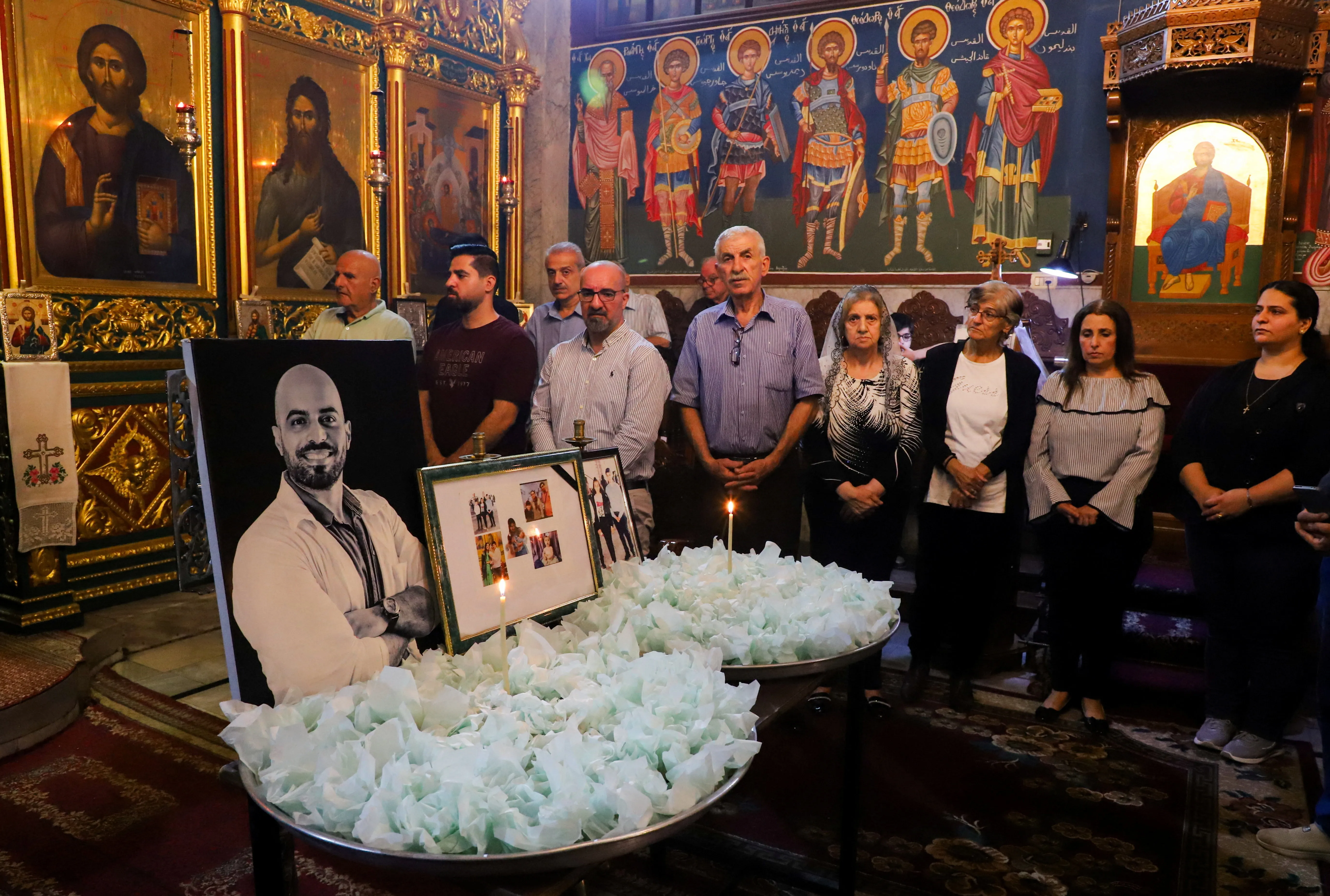 Palestinian worshippers attend a memorial service at the Greek Orthodox Saint Porphyrius Church, to honor those killed during the war, including victims of the 2023 Israeli strike on the church, in Gaza City, October 24, 2025. REUTERS/Ebrahim Hajjaj