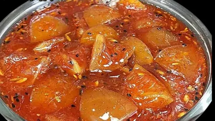 This may contain: a glass bowl filled with food on top of a table