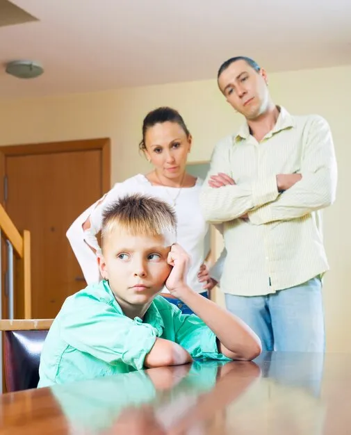 Free photo parents scolding teenage child in home