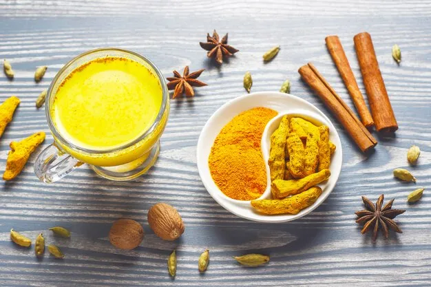 Free photo traditional indian drink turmeric golden milk .