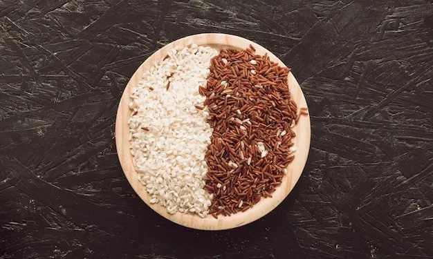 Free photo wooden bowl with raw red long grain jasmine and white rice on rough background