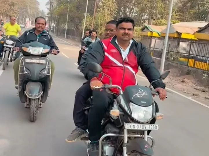 Durg Minister Rides Bike Without Helmet Amid Road Safety Month