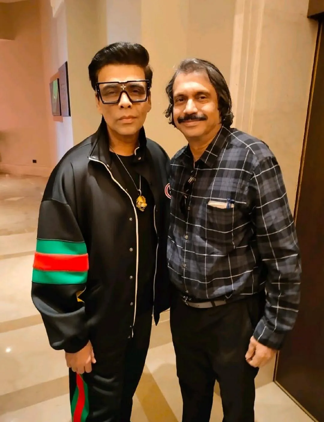 Showman Karan Johar with sr journalist Chaitanya Padukone