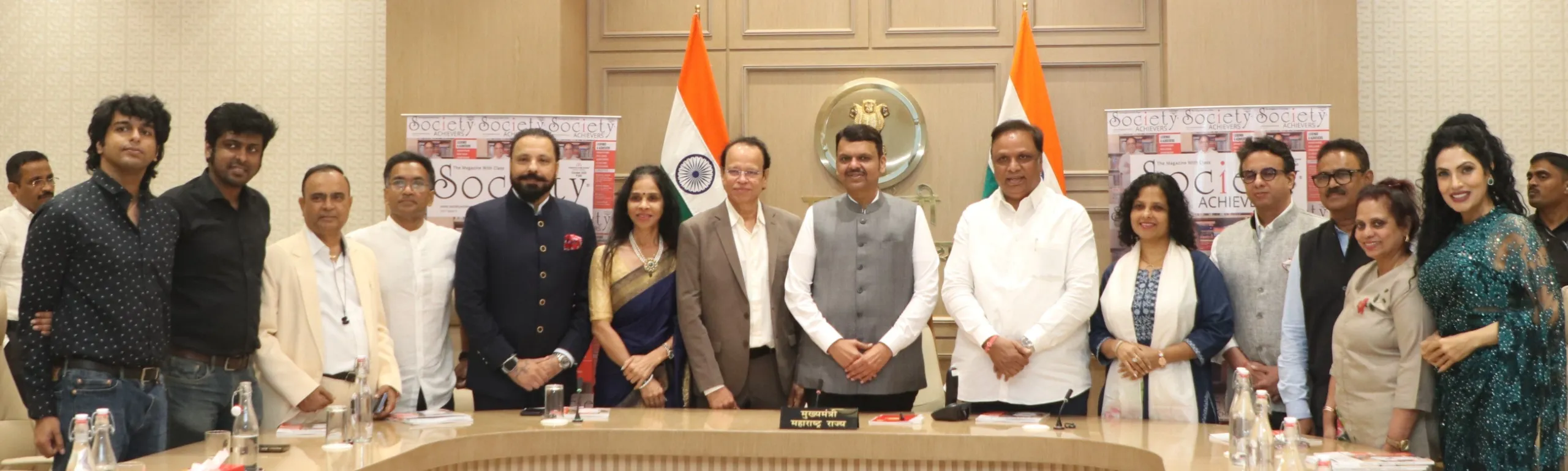 Vedant Gill, Siddhant Gill, Yogesh Lakhani, Shivendra Parihar, Bunty Walia, Jayshree Dhamankar, Ashok Dhamankar, Hon CM Devendra Fadnavis, Hon Min Ashish Shelar, Andrea CostaBir, Architect Behzad Kharas, Sunil Khavnekar, Preeta Nair and Simran Ahuja at the unveiling of the Society Achievers Magazine cover featuring Hon Min Ashish Shelar at the hands of Hon CM Devendra Fadnavis