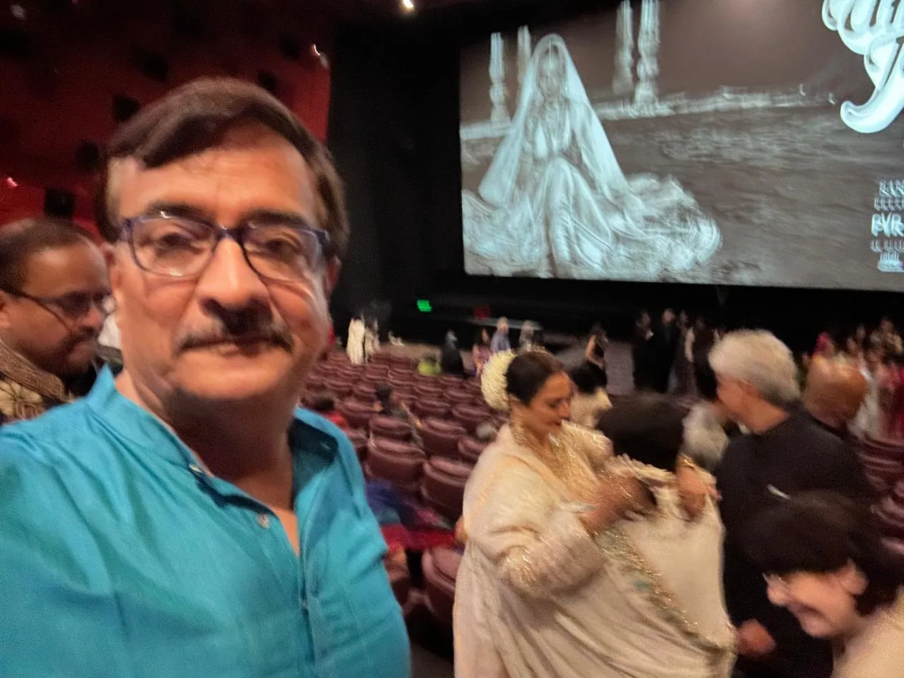 With Rekha