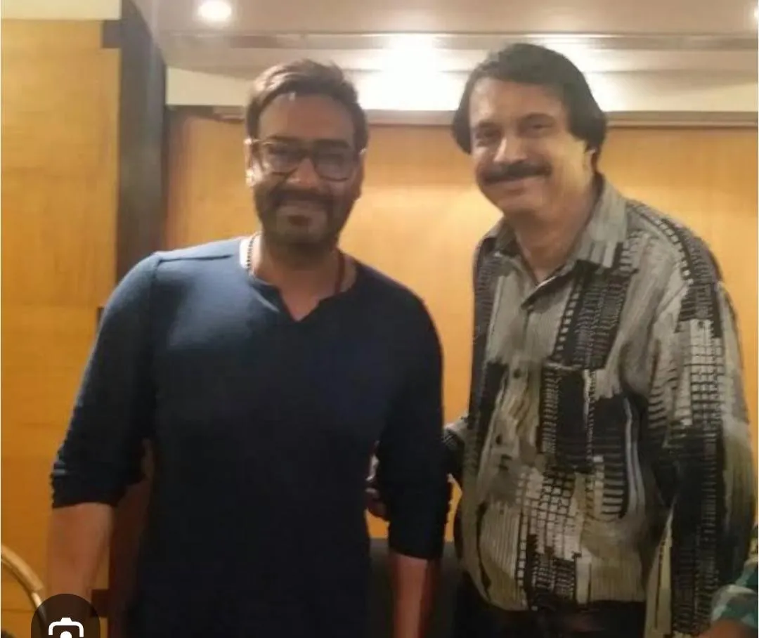 Mega star Ajay Devgn with sr journalist Chaitanya Padukone