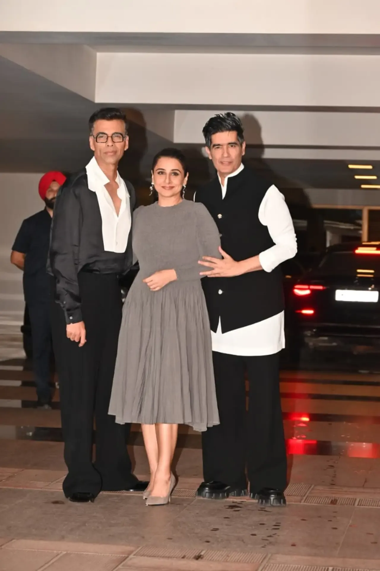Karan Johar, Manish Malhotra and Vidya Balan were seen posing for paps as they arrived for the birthday celebrations.