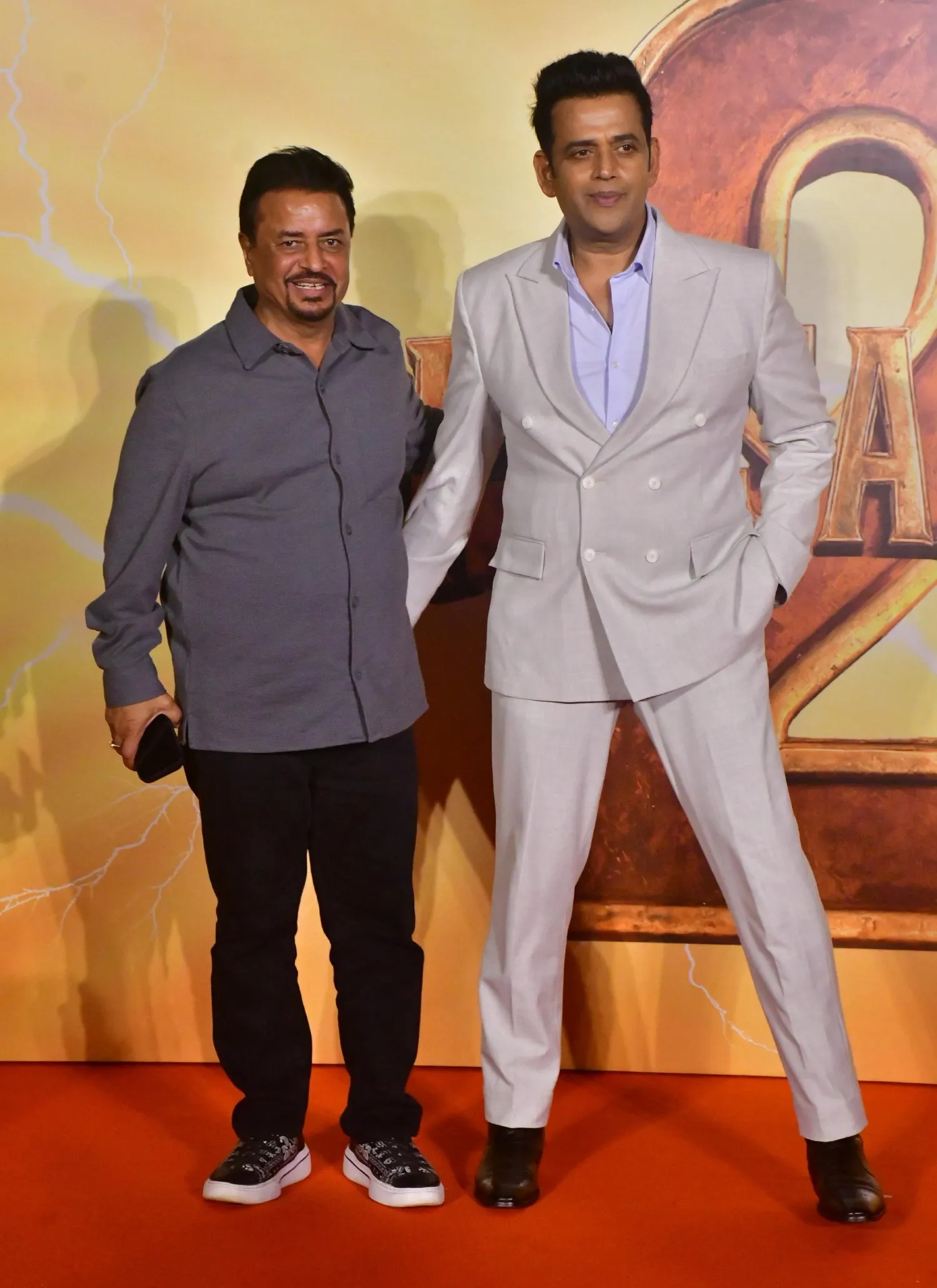 Kumar Mangat Pathak and Ravi Kishan share a candid moment while posing together.