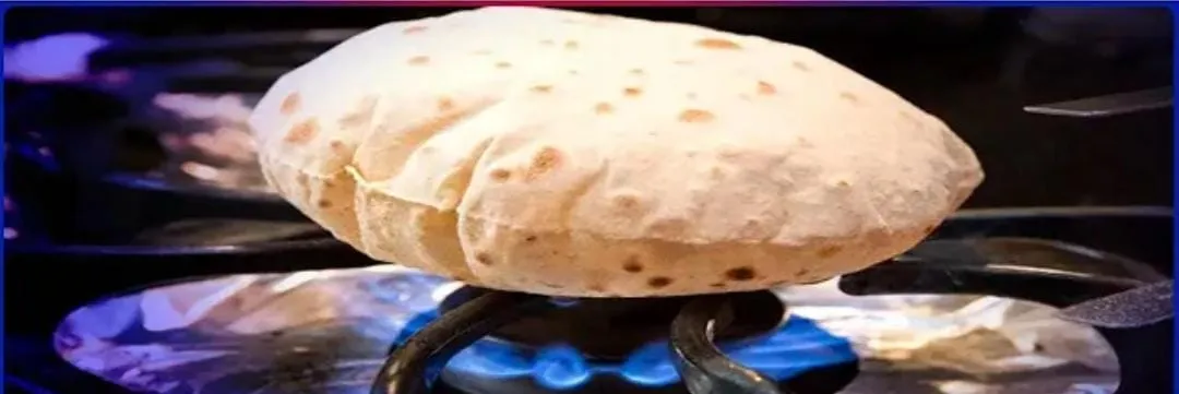 Cooking Roti on Flames