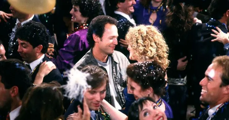 This may contain: a group of people standing next to each other in front of some balloons and confetti