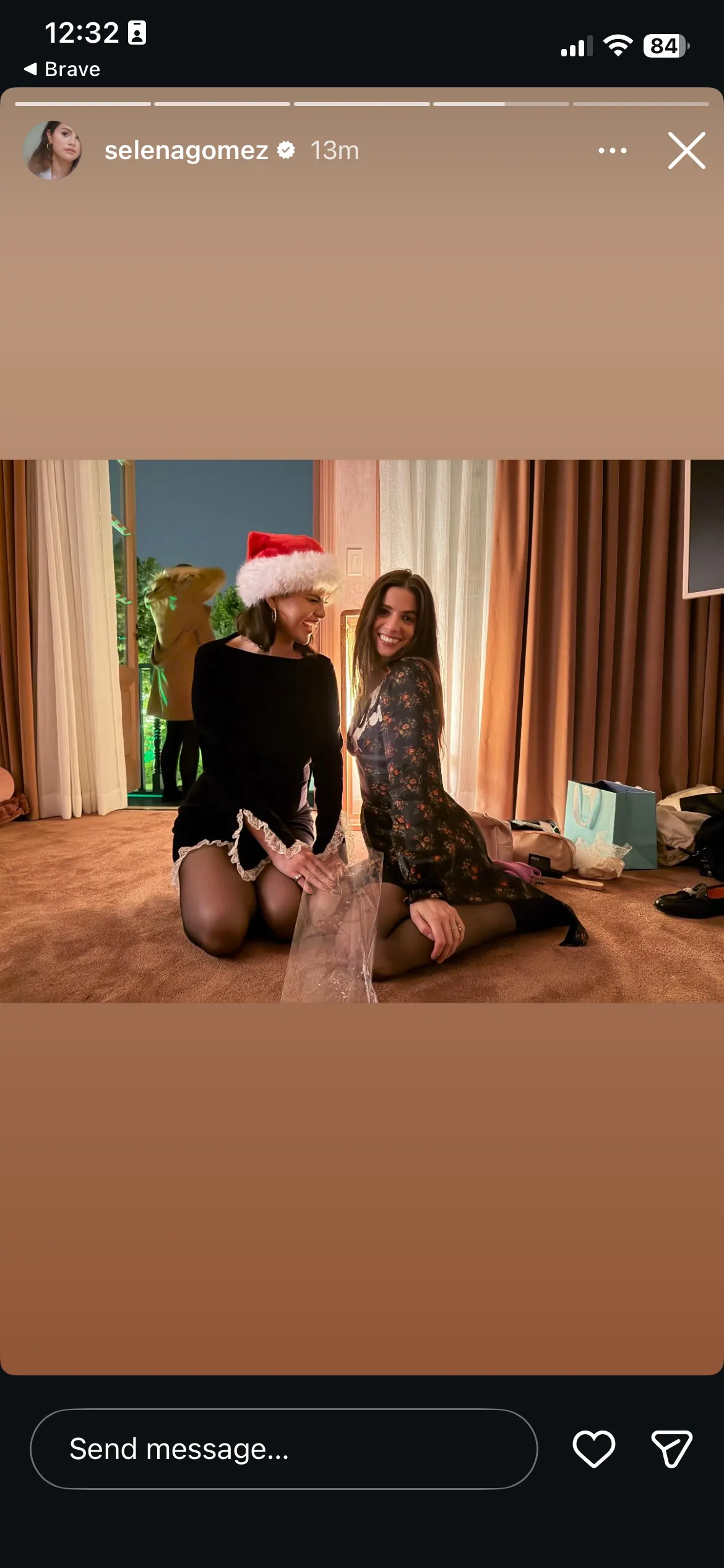 Selena Gomez in a black holiday dress