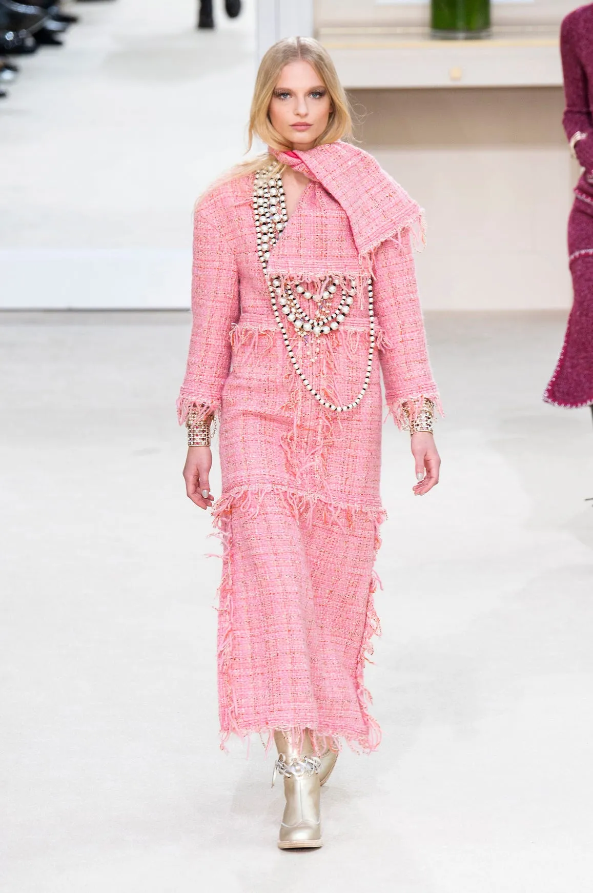 model showcasing a unique pink textured outfit
