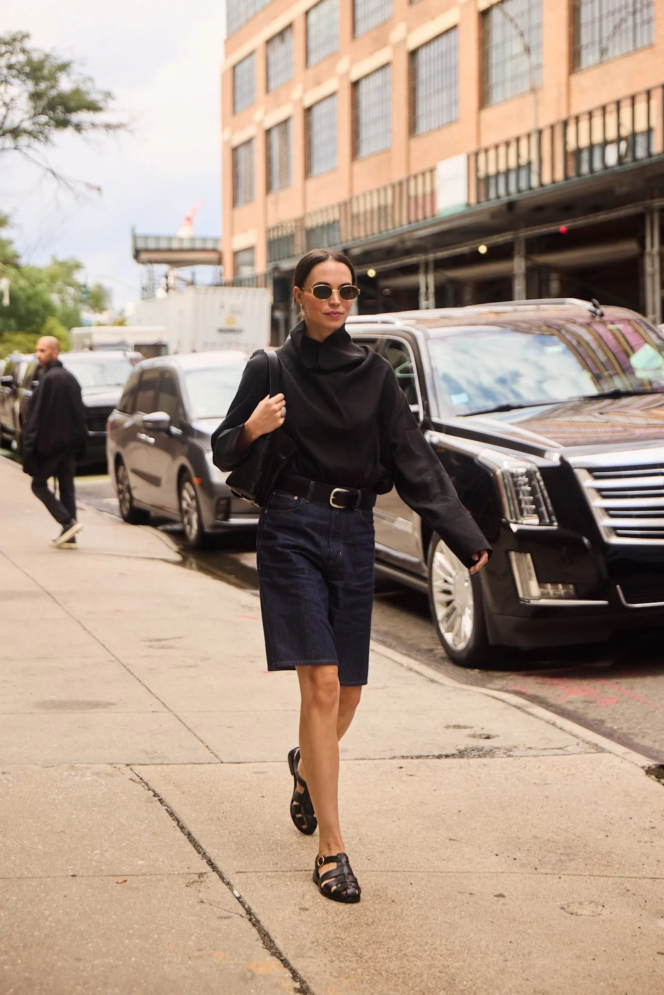 woman wearing jorts and fisherman sandals