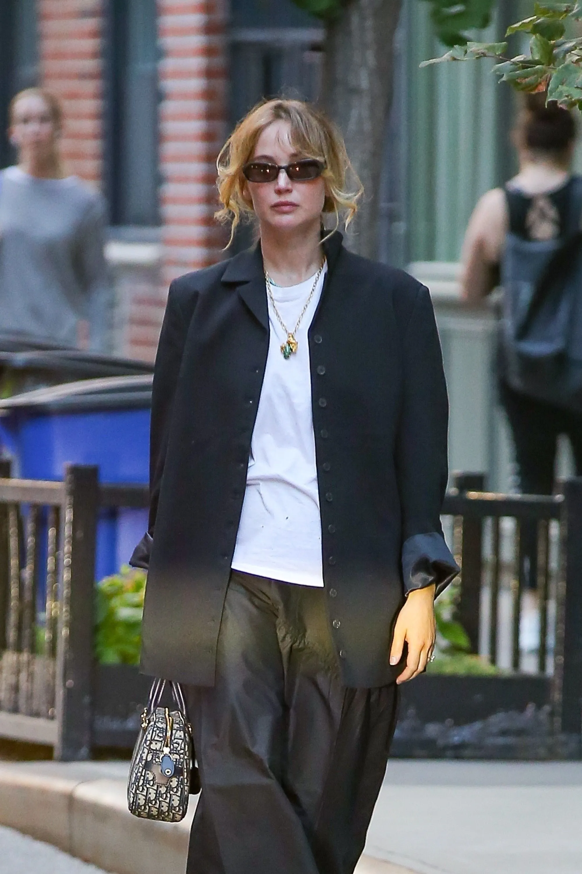 Jennifer Lawrence Zhuzhes Up a White Tee for Date Night | Vogue