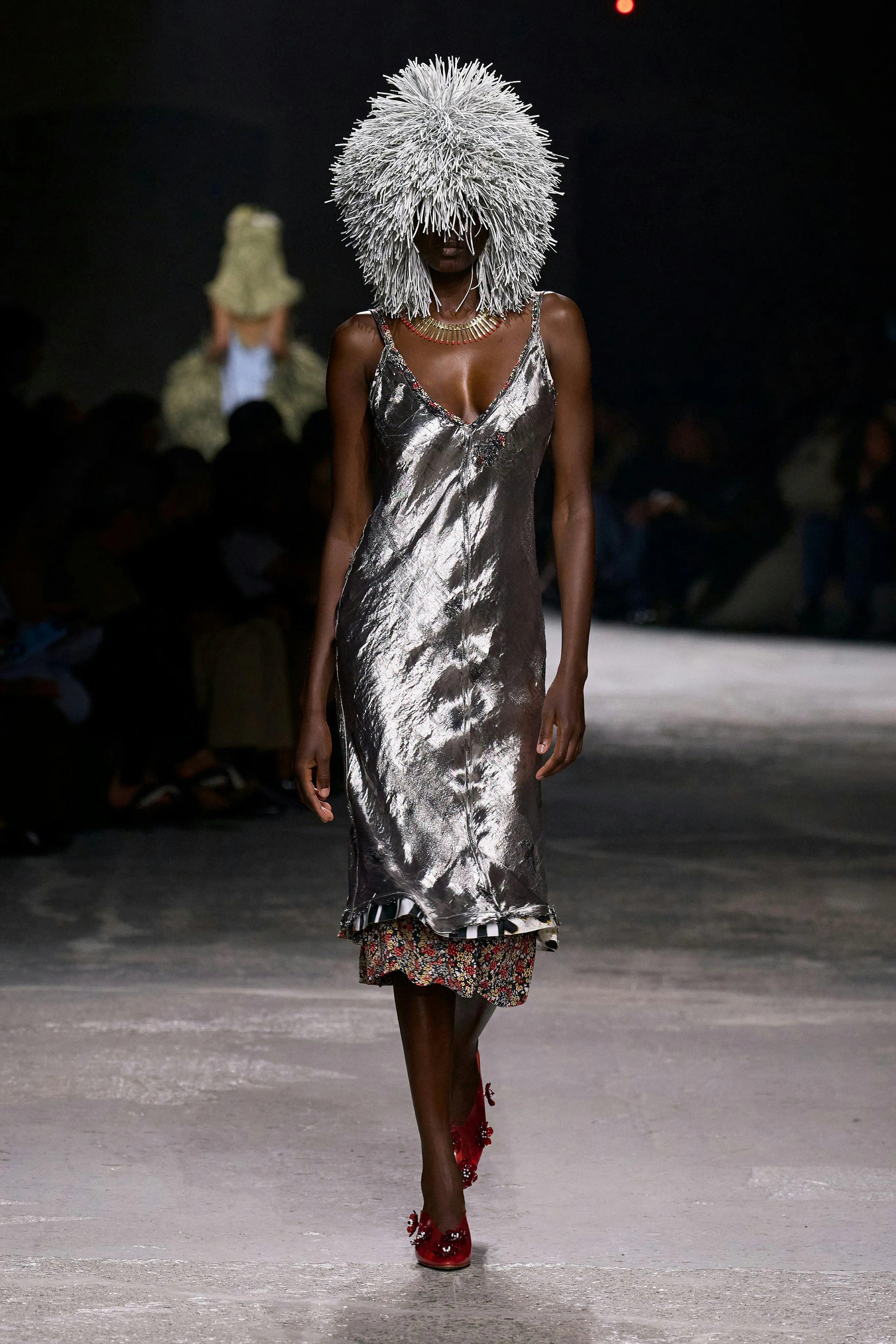 Model on the runway at Bottega Veneta RTW Spring 2025 as part of Milan Ready to Wear Fashion Week on...