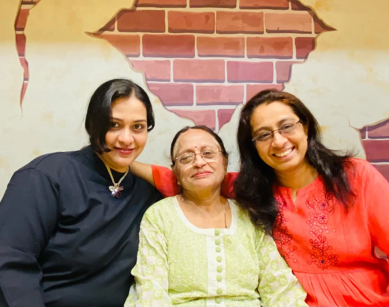 Nayana with her daughters