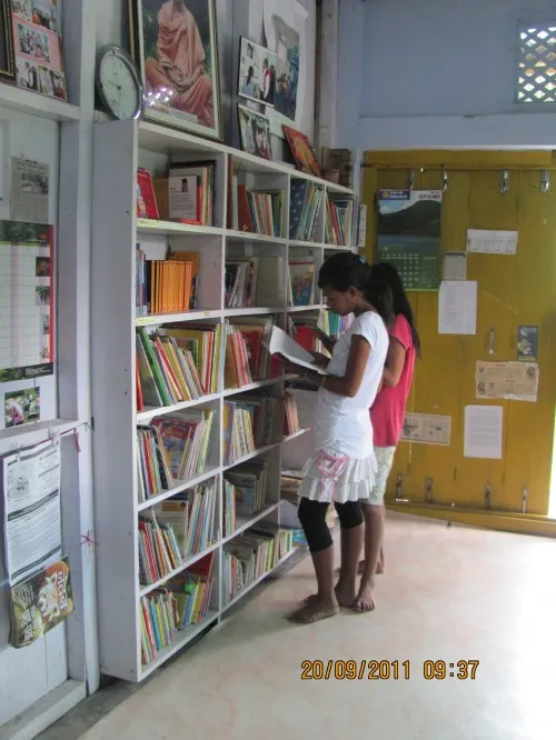 Children inside the Apne Library, Wakro