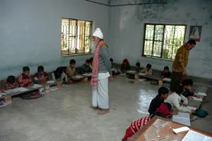 Even at the age of 95, Mr. Biswas teaches 10th standard Mathematics to the students in his school.