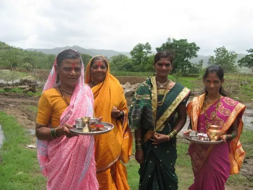 Women celebrating the festival of Vatapoornima in Mogarwadi. They hold fasts and perform poojas for the longetivity of the breadwinners of their families - the farmers working far away in the fields.