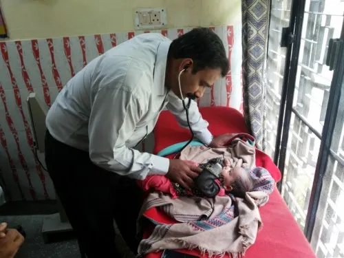 Dr Jayakumar Reddy treating a newborn child