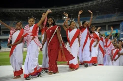 On July 13, 18 tribal girls from Ormanjhi village in Jharkhand cheered in traditional attire after being placed third in the Gasteiz Cup in Spain (Photo Courtesy: The Hindu) 
