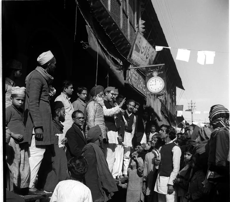 Mir Mushtaq Ahmed, a Socialist candidate is seen here canvassing for himself in a Delhi Street. He contested for a seat in the State Assembly.