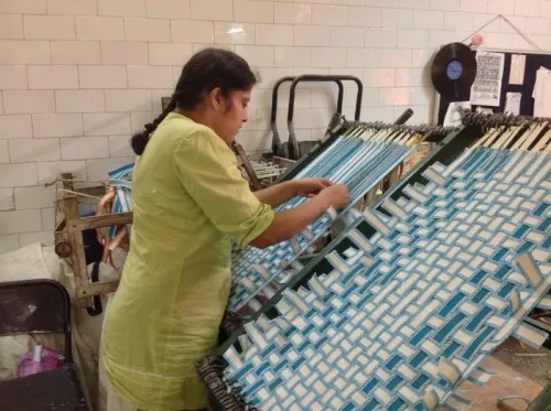 Weaving mats at the Society