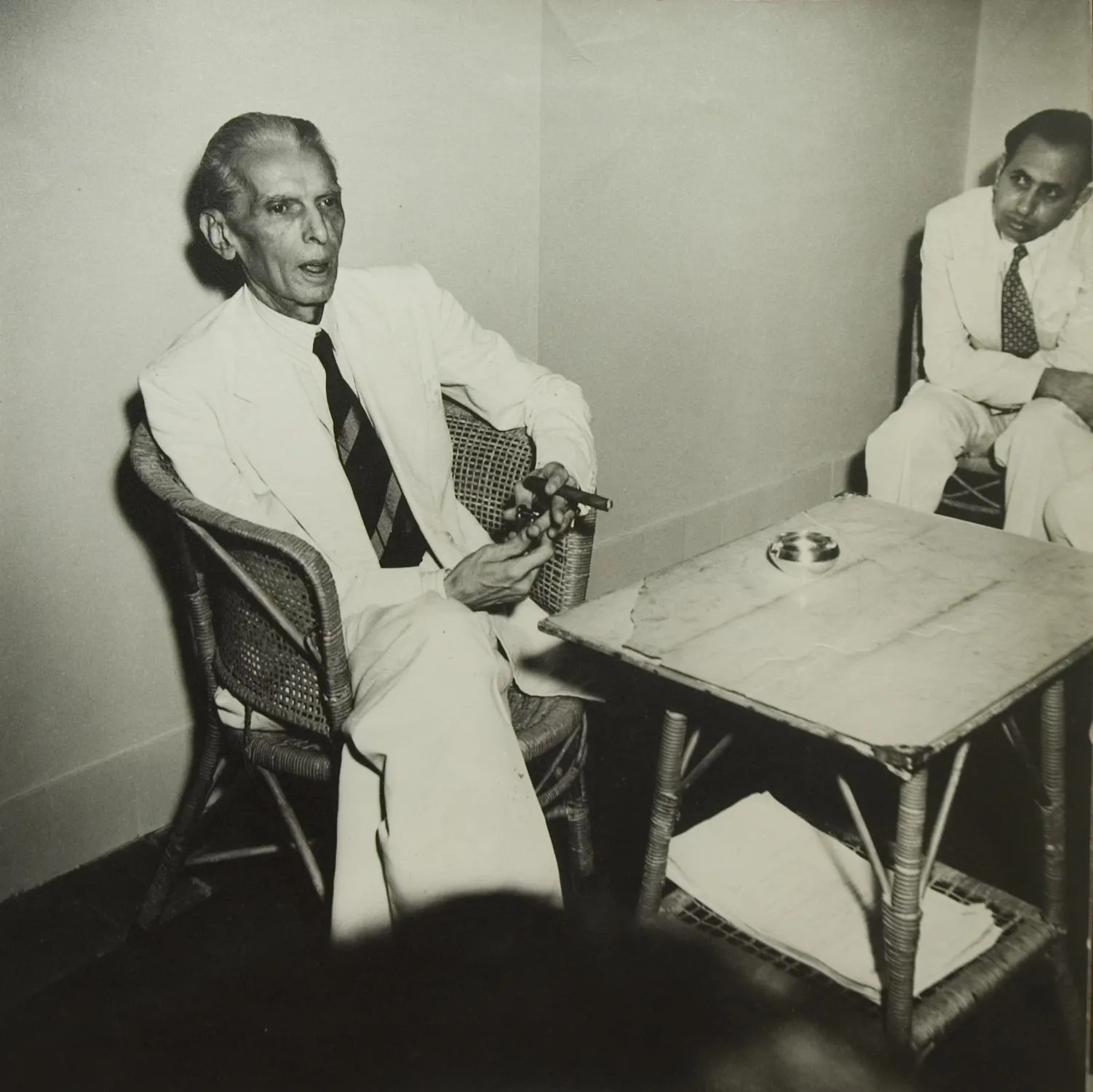 Mohammad Ali Jinnah at his last Press Conference before leaving for Pakistan; August 1947 Gelatin Silver Print From the exhibition: Candid: The Lens and Life of Homai Vyarawalla Collection: Alkazi Collection of Photography Image Courtesy: Rubin Museum of Art, New York ​)​​