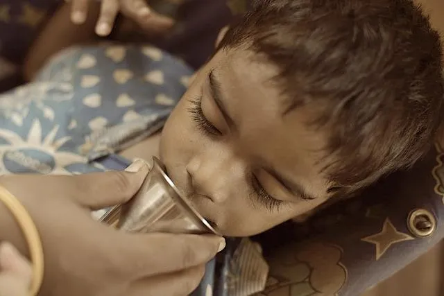 This boy is not only paralysed in his legs, he also has pain if he closes his jaw. Simple tasks like drinking water become a trial for those who feed. Half the water goes trickling down the sides of the mouth.