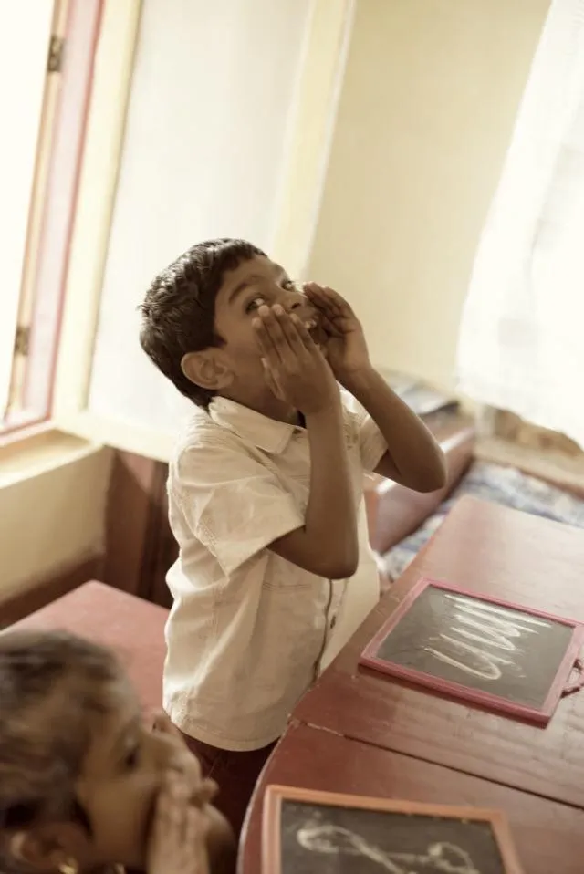 This boy cannot speak but manages to express himself with an eagerness to overcome his disability. He loves Johnny, Johnny, yes papa.