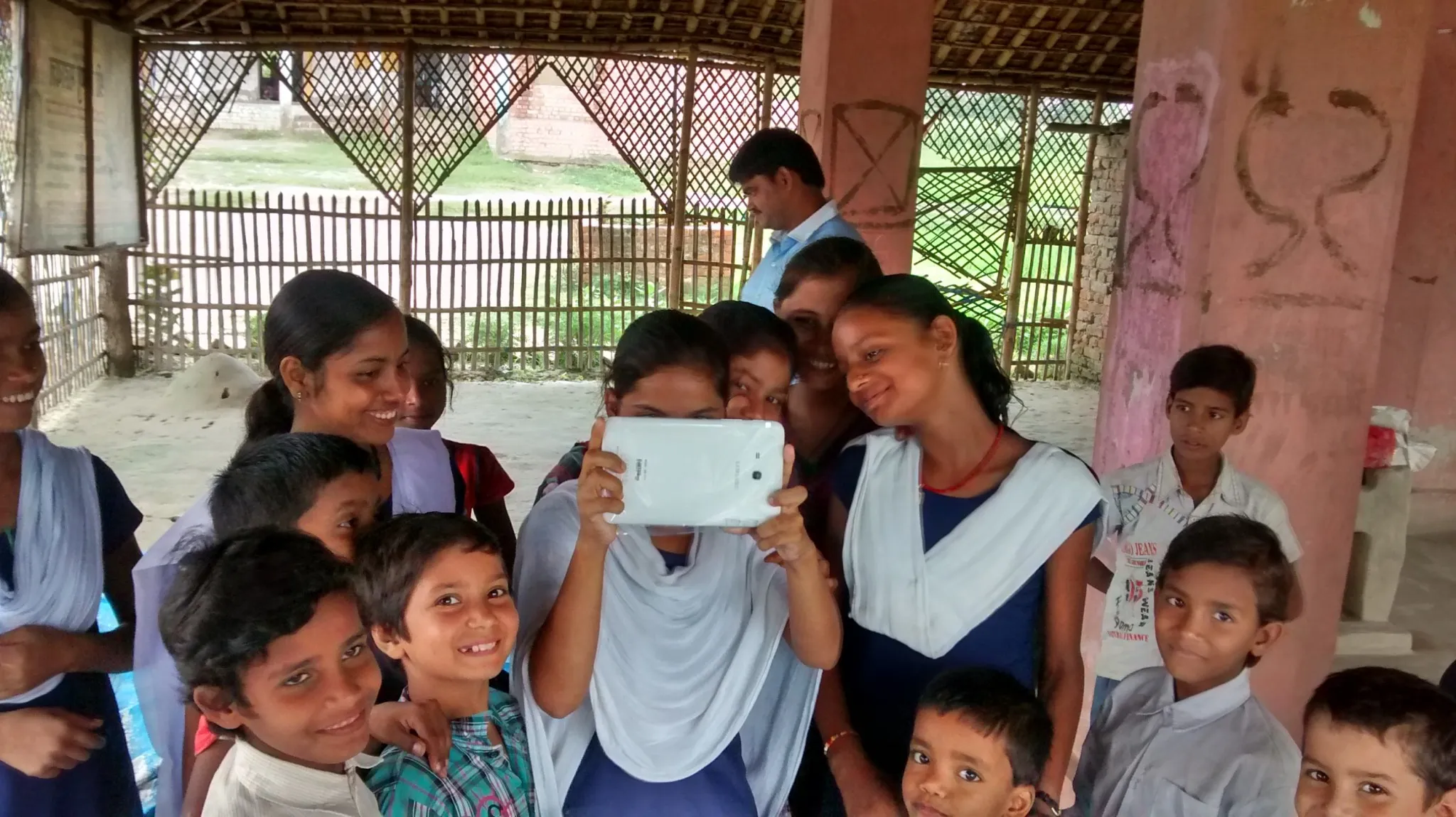 Girls exploring a tablet for the first time
