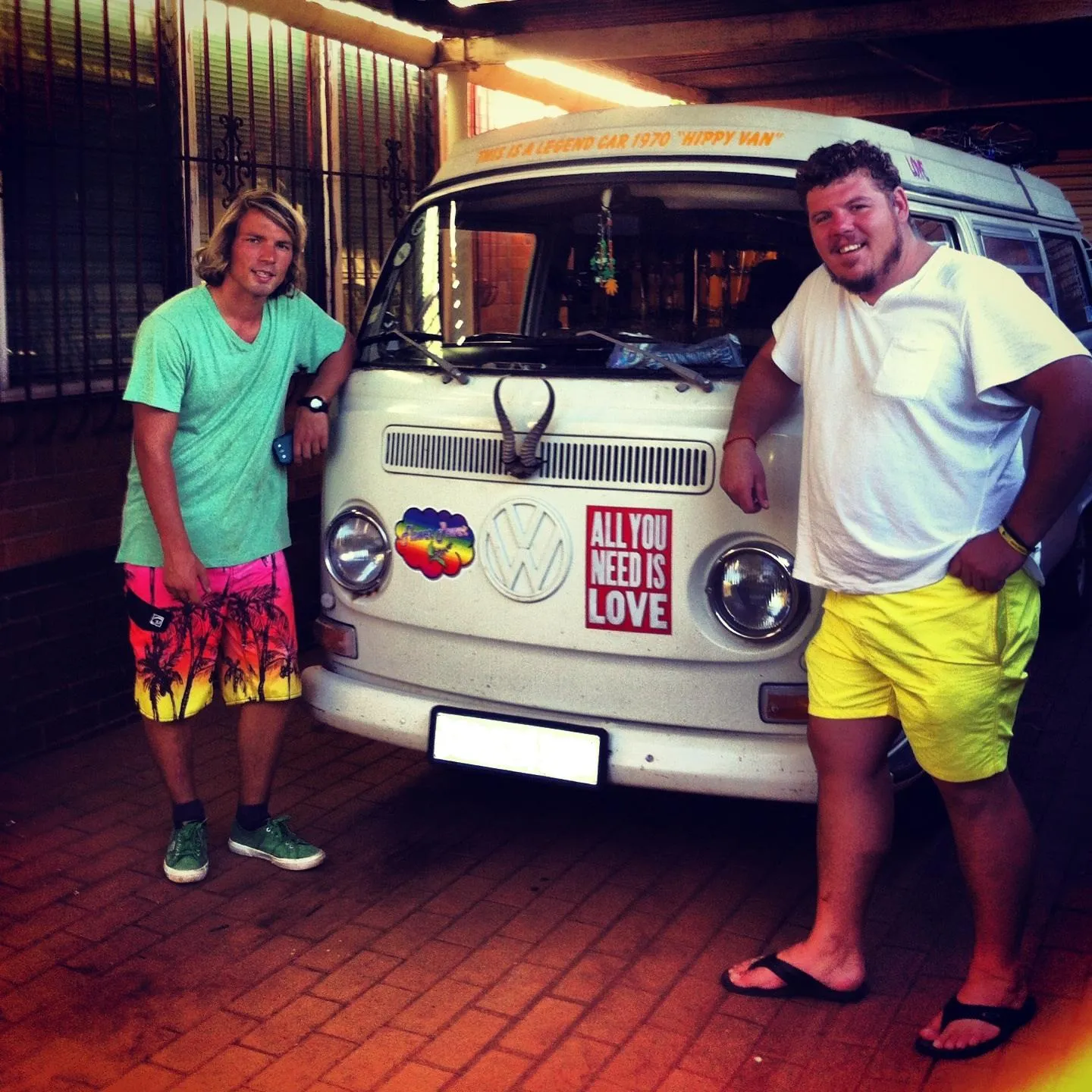 Jaco (left) with his beloved VW Camper van