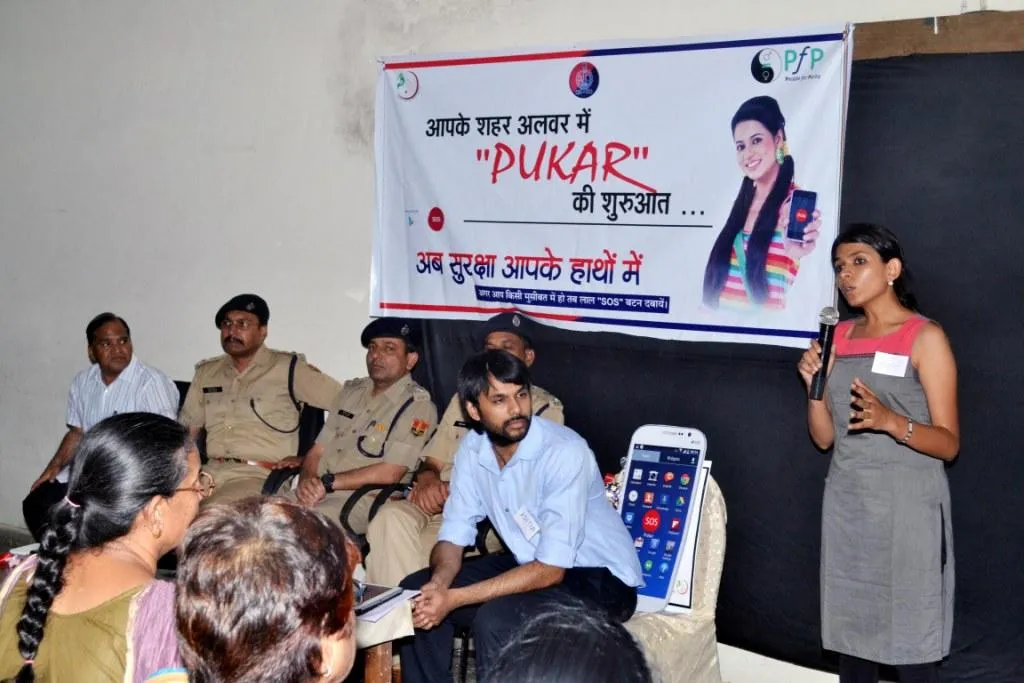 Arushi explaining how Pukar works and why it will be effective to use in emergencies to an audience of social sector leaders, press and police personnel at the launch of Pukar in Alwar.