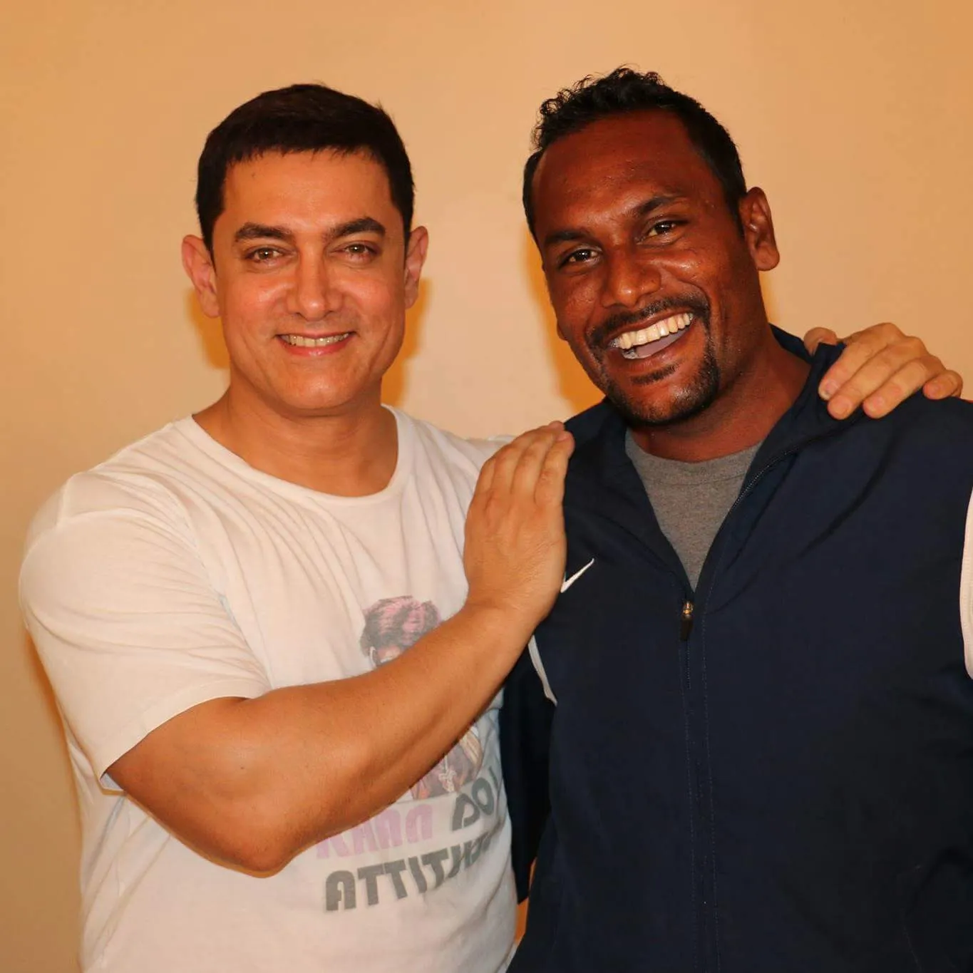 Akhilesh (right) with Amir Khan.
