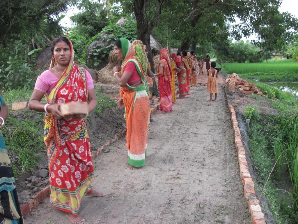 Parul Mondol, 45, who helped in the construction of the brick road, is happy that the villagers now have access to schooling, healthcare and many other government facilities. (Credit: Saadia Azim\WFS)