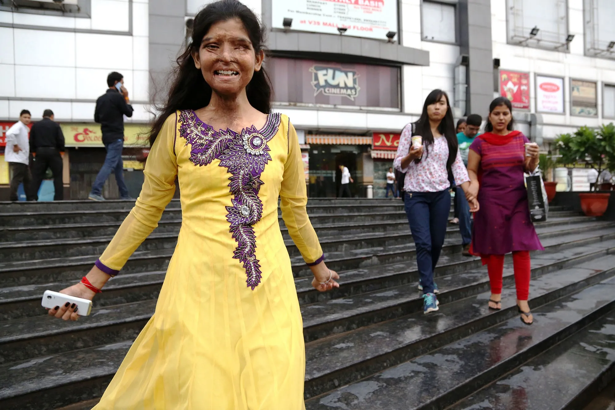 Among the many strong women whose incredible spirit and chutzpah Pascal caught on camera is this cheerful image of an acid attack survivor. 