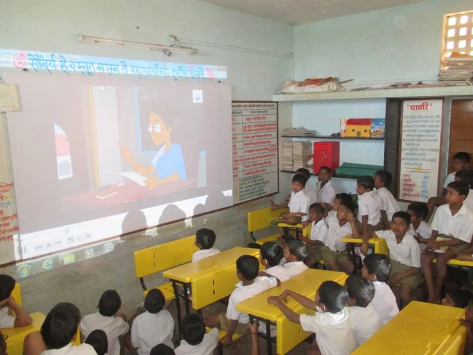 Students keenly watching awareness video - SBM Kolhapur Zilla (Maharastra)