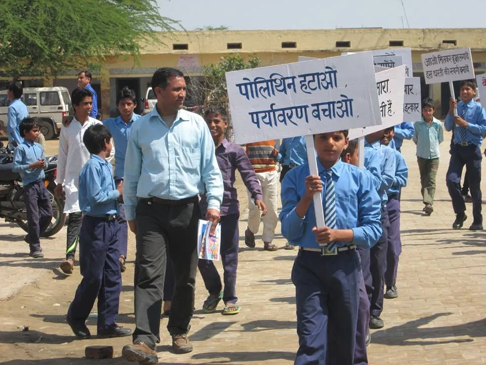 Students holding placards 