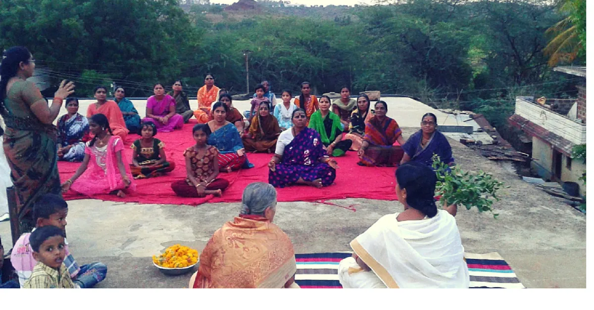 A large number of villagers show up for her classes.