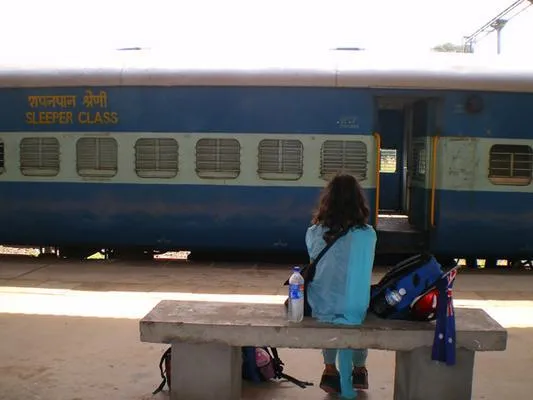 Zekiye Yildirim waiting for train in Alleppey, India.