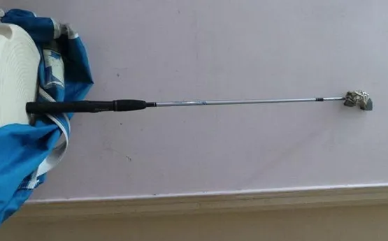 Benny's self-styled nail collecting instrument.