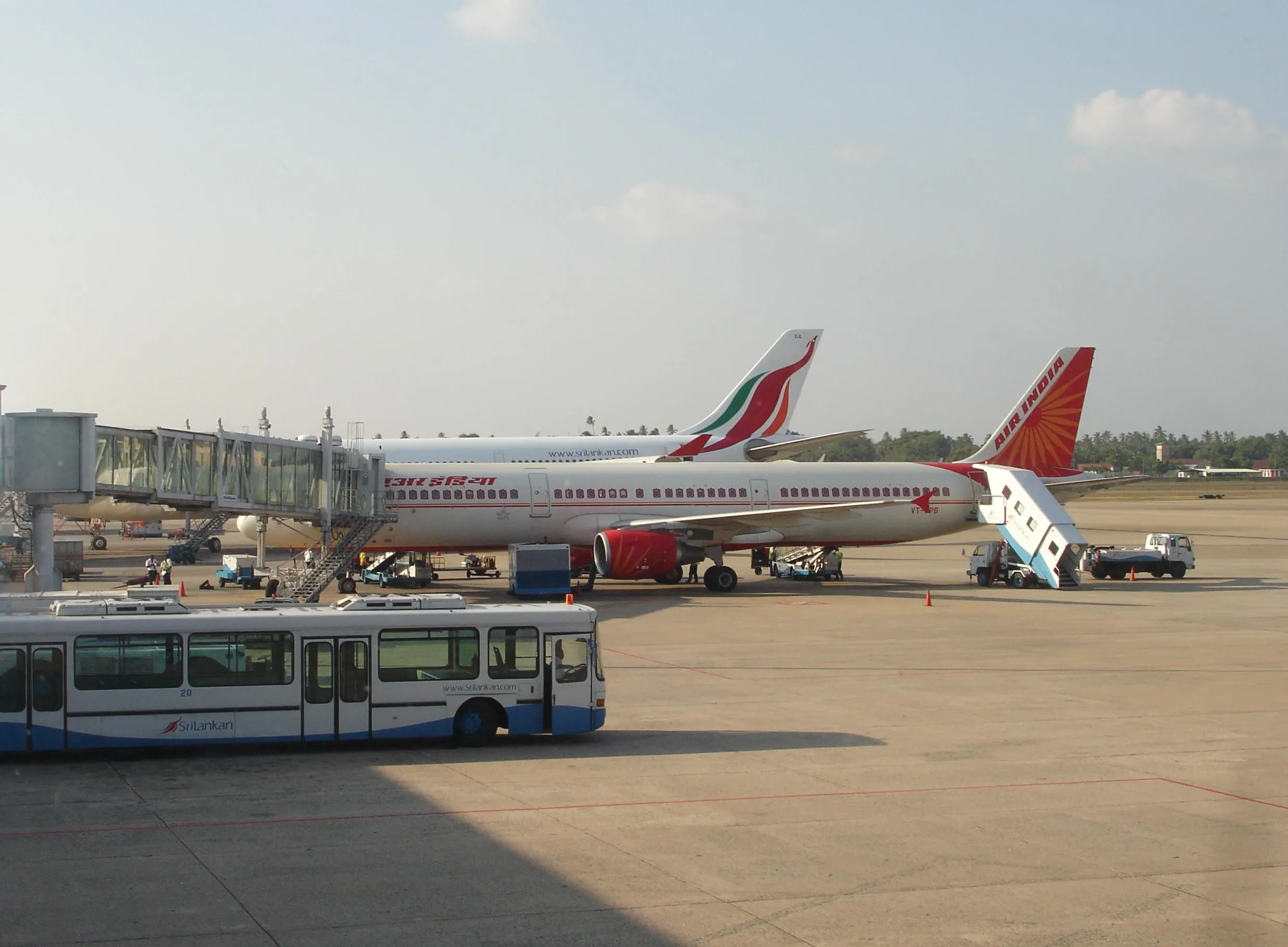 Air_India_and_SriLankan_aircraft_at_colomobo_airport_terminal